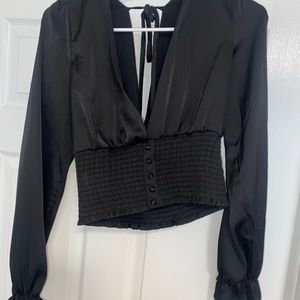 Low cut v neck blouse, ties in back